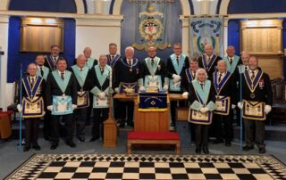 Ryan Uhli amongst his officers and members of the Ampthill Lodge